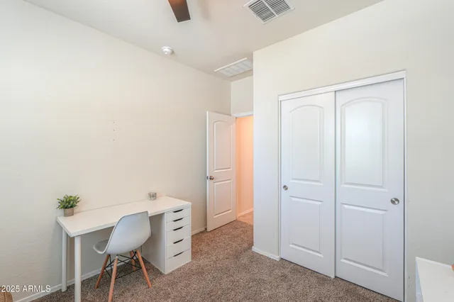 a room with a table and chairs