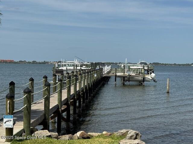 430 Strand Drive Melbourne Beach, FL 32951 - Photo 34 of 36 a view of roof deck with two chairs and wooden floor