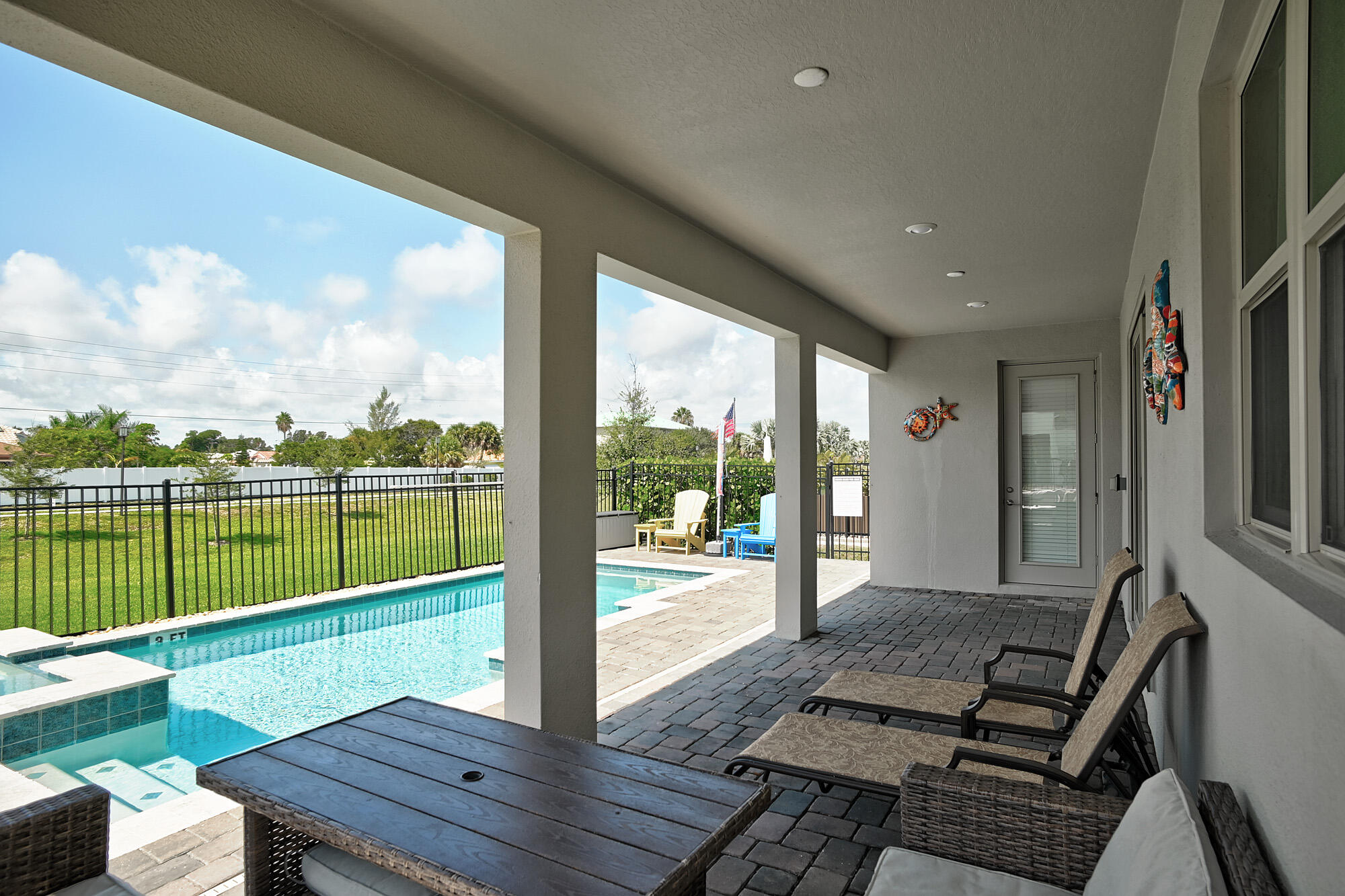 430 Strand Drive Melbourne Beach, FL 32951 - Photo 5 of 36 a view of a balcony with wooden floor