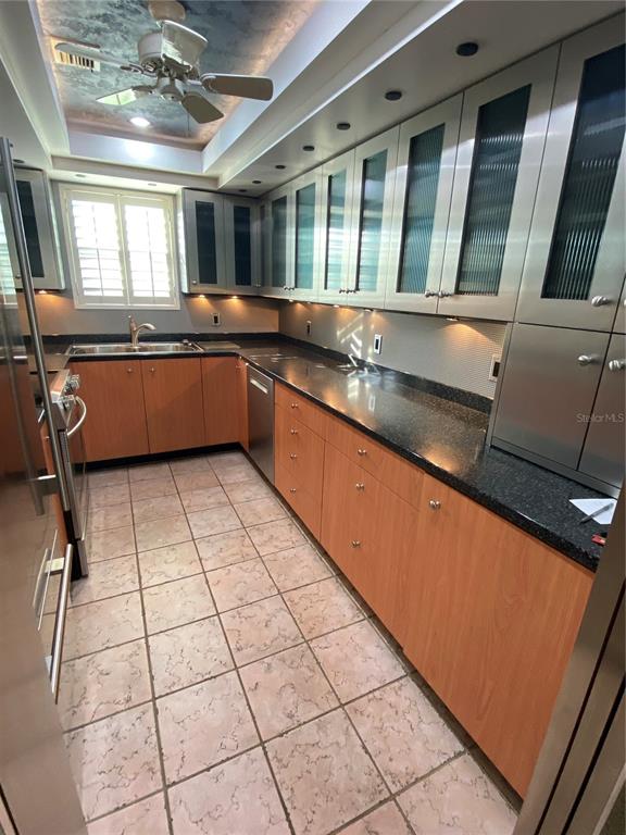 1500 Gay Road, Unit 17D Winter Park, FL 32789 - Photo 10 of 34 a large kitchen with a sink and cabinets