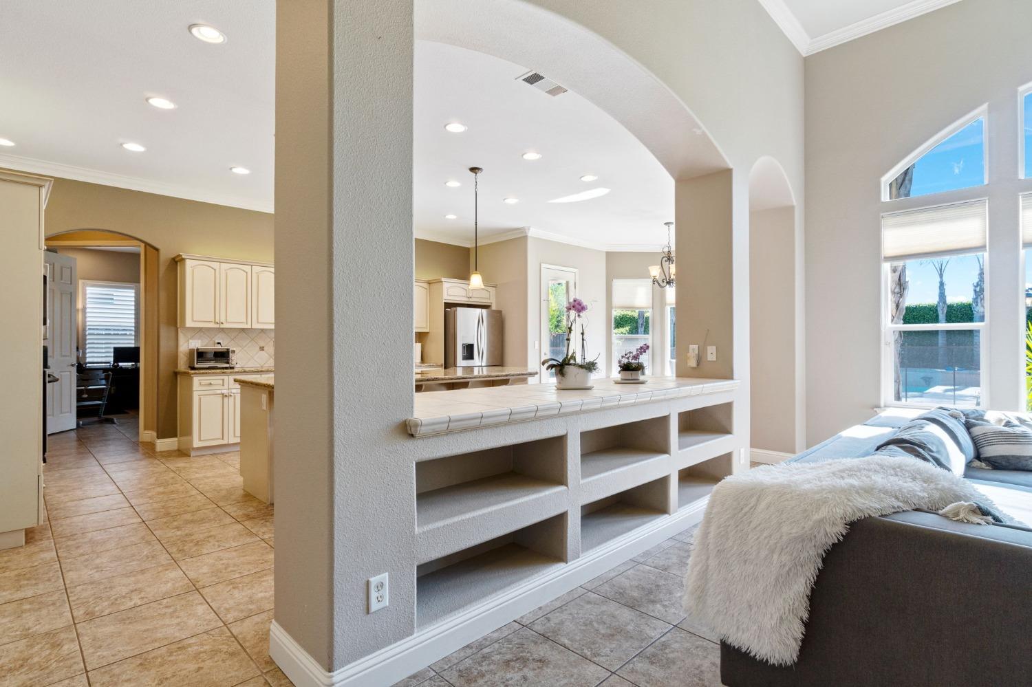 1847 Megan Avenue Clovis, CA 93619 - Photo 17 of 40 a bedroom with a bed and a view of kitchen