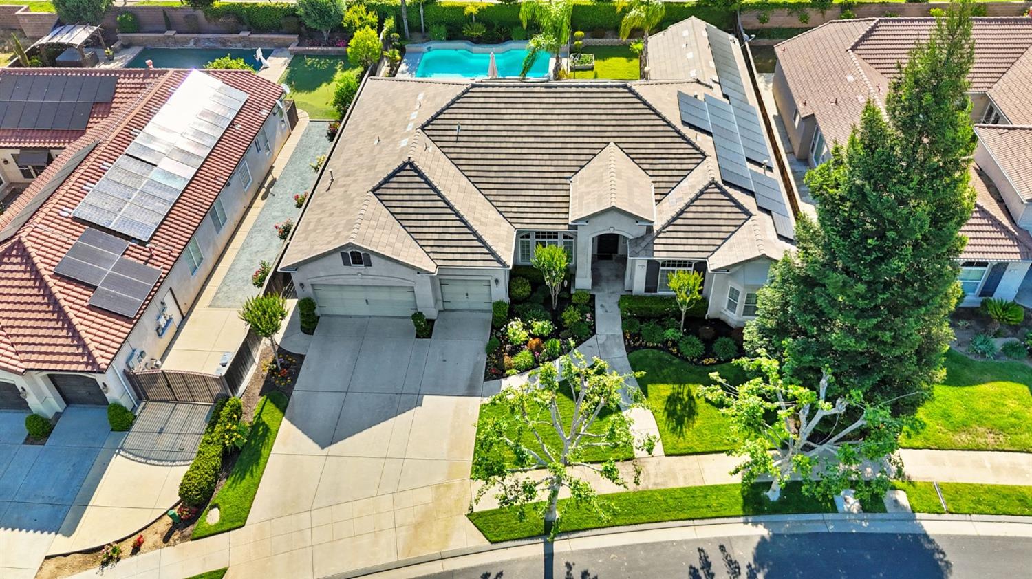 1847 Megan Avenue Clovis, CA 93619 - Photo 3 of 40 a aerial view of a house with a yard