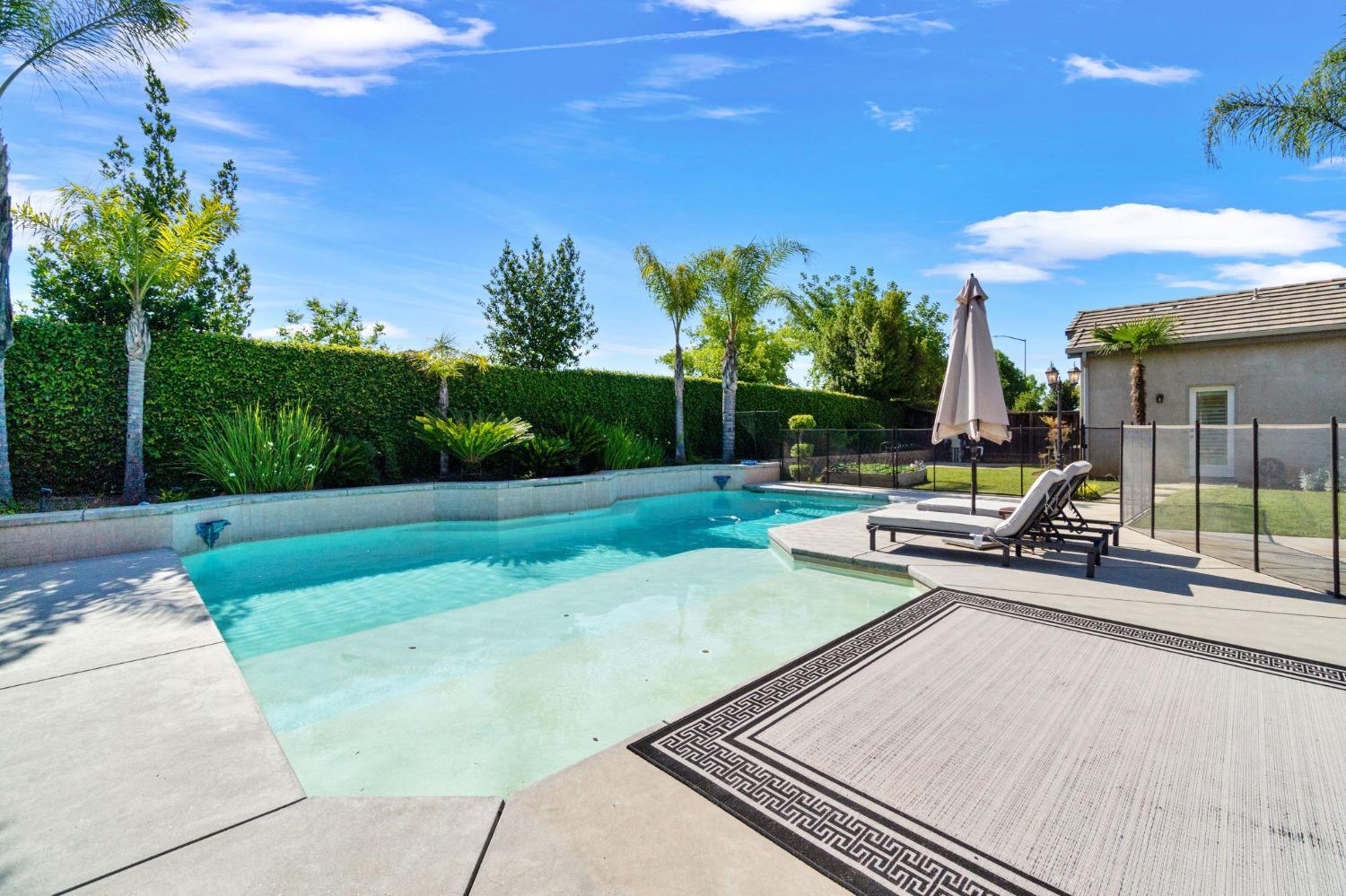 1847 Megan Avenue Clovis, CA 93619 - Photo 35 of 40 a view of a backyard with sitting area