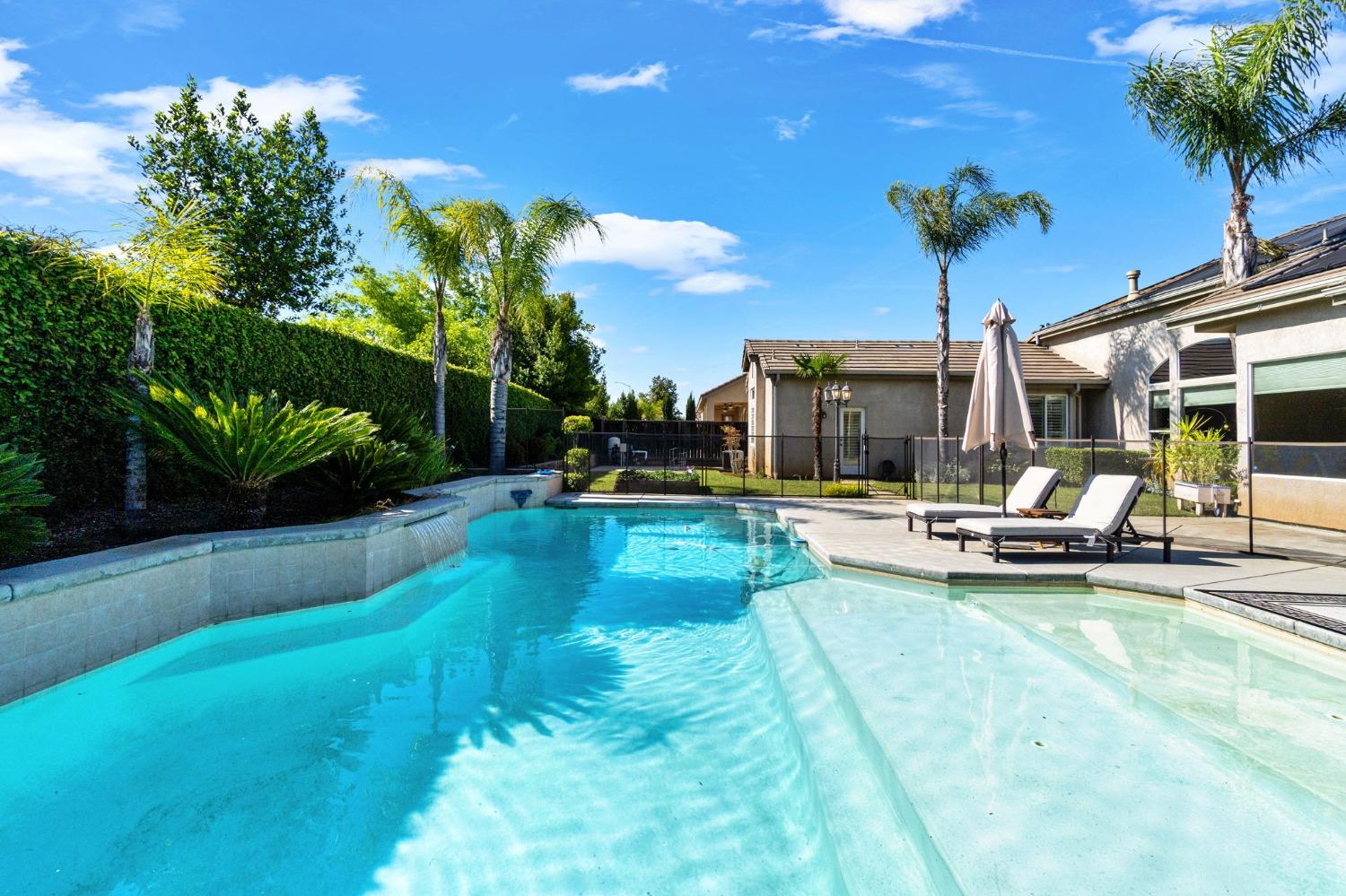 1847 Megan Avenue Clovis, CA 93619 - Photo 36 of 40 a view of a swimming pool with a patio