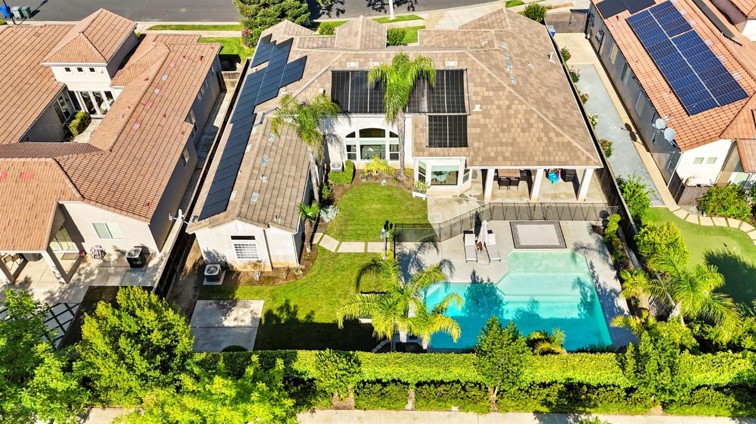 1847 Megan Avenue Clovis, CA 93619 - Photo 37 of 40 an aerial view of residential houses with outdoor space and street view