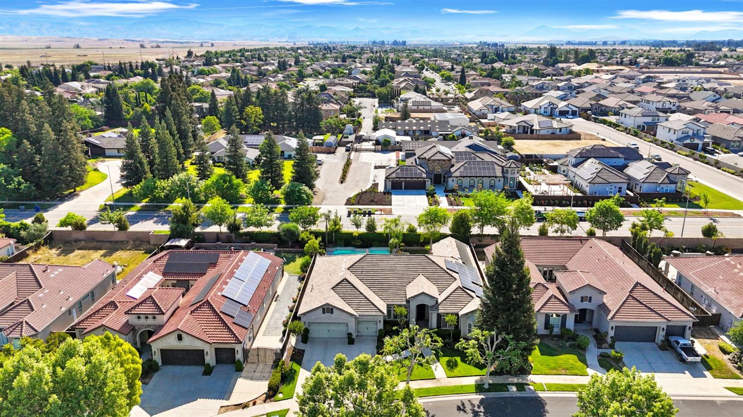 1847 Megan Avenue Clovis, CA 93619 - Photo 38 of 40 an aerial view of residential houses with outdoor space and swimming pool