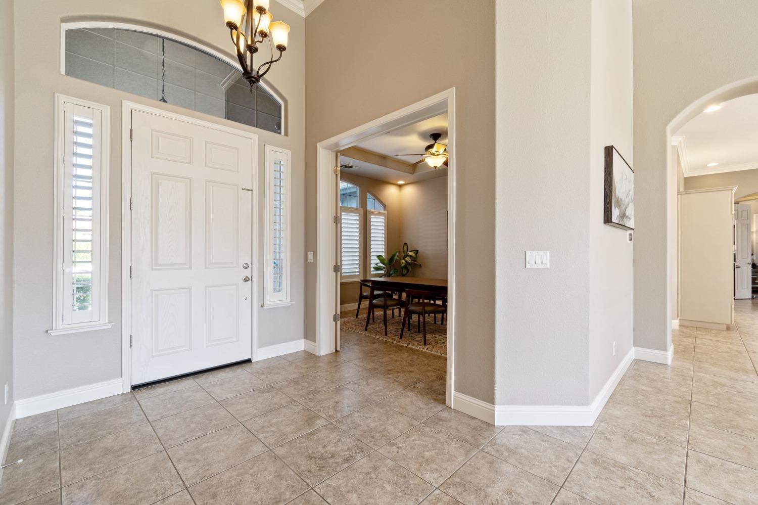 1847 Megan Avenue Clovis, CA 93619 - Photo 7 of 40 an entryway and a livingroom view with a hallway