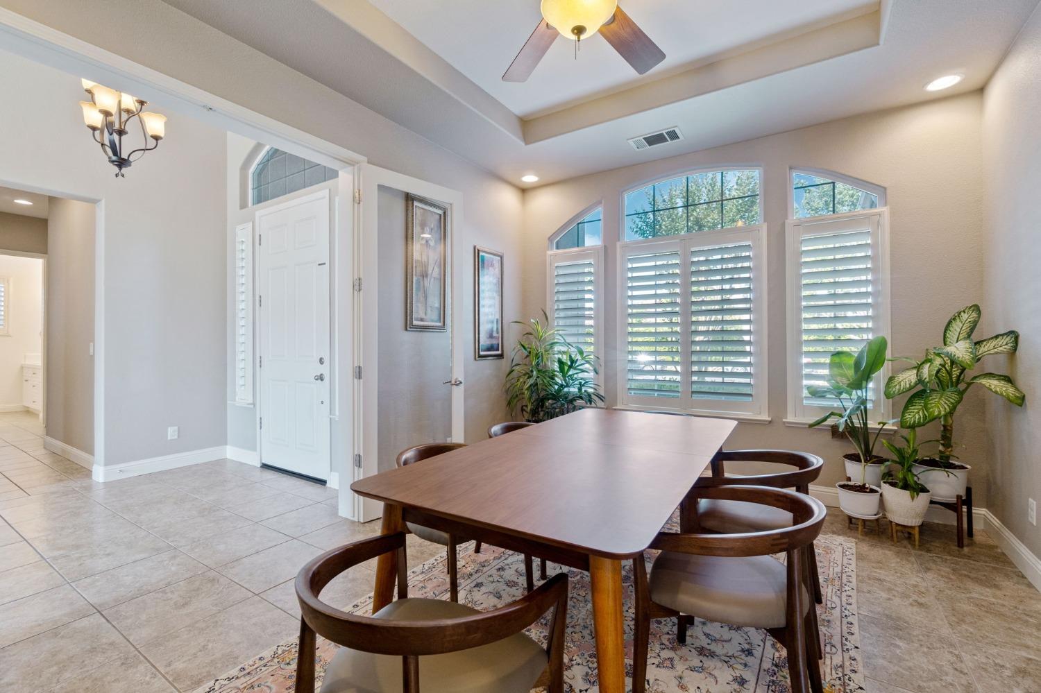 1847 Megan Avenue Clovis, CA 93619 - Photo 8 of 40 a view of a livingroom with furniture and a potted plant