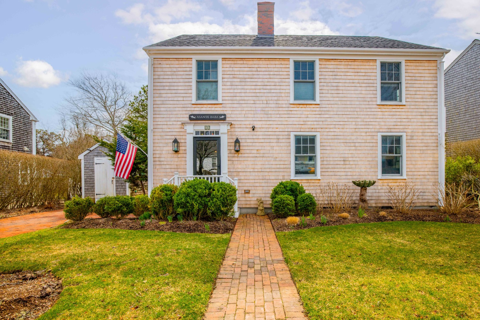15 Goldfinch Drive Nantucket, MA 02554 - Photo 2 of 19 a front view of a house with a yard