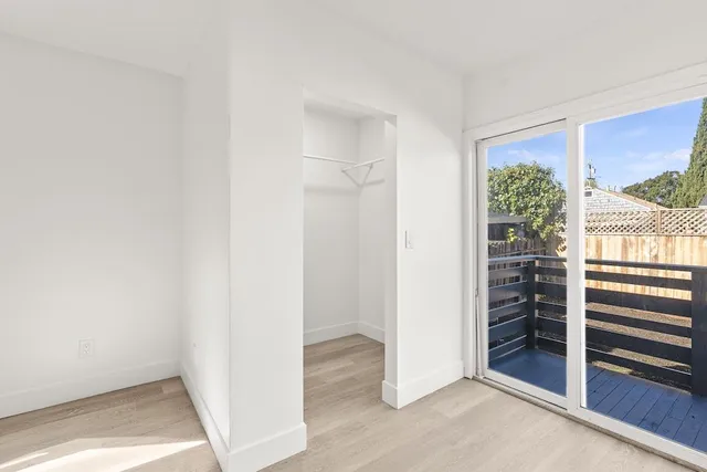 a view of livingroom with furniture and a window