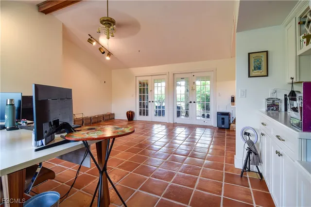 a bathroom with a sink and a window