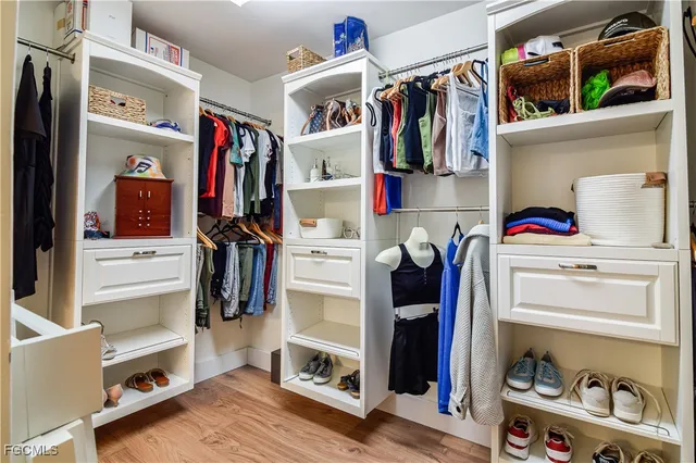 a room with a sink and cabinets
