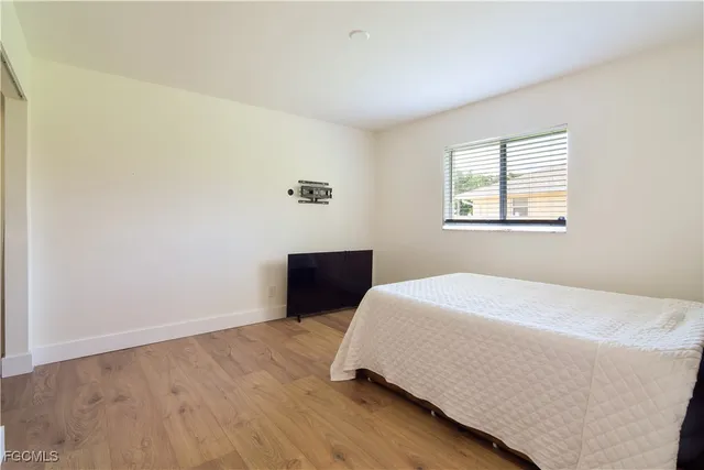 a lobby with furniture and window