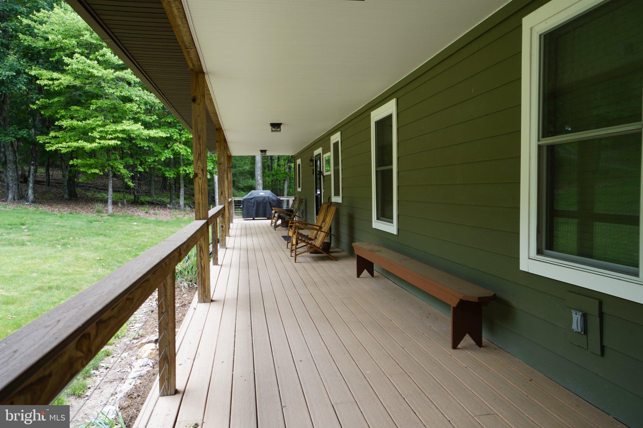 150 Sharp Ridge Lane Franklin, WV 26807 - Photo 4 of 69 Serene porch with lush green views.