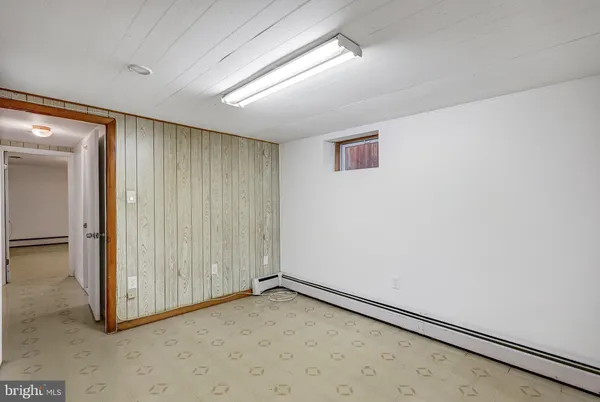 an empty room with a workbench