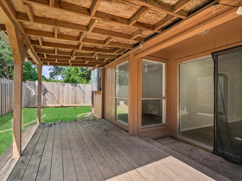 6631 Ambler Drive Spring, TX 77379 - Photo 31 of 37 a view of porch with wooden floor