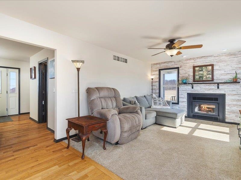 911.41 Melugins Grove Compton, IL 61318 - Photo 16 of 68 a living room with furniture and a fireplace
