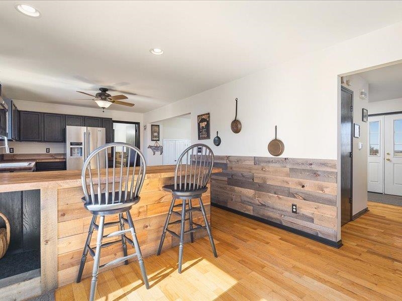911.41 Melugins Grove Compton, IL 61318 - Photo 17 of 68 a view of a dining room with furniture and chandelier