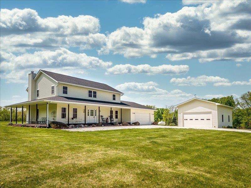 911.41 Melugins Grove Compton, IL 61318 - Photo 4 of 68 a front view of house with swimming pool having outdoor seating