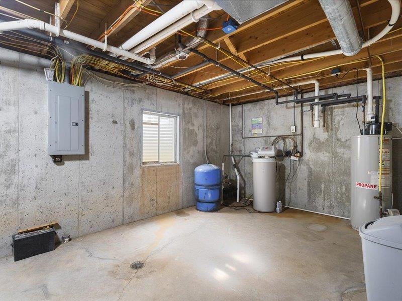 911.41 Melugins Grove Compton, IL 61318 - Photo 41 of 68 a view of a storage room with a utility room