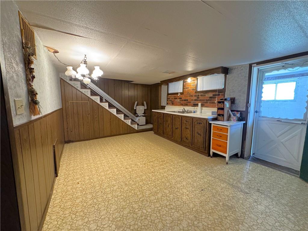 1076-1078 Addison Street Washington, PA 15301 - Photo 14 of 50 a view of a kitchen with furniture and window