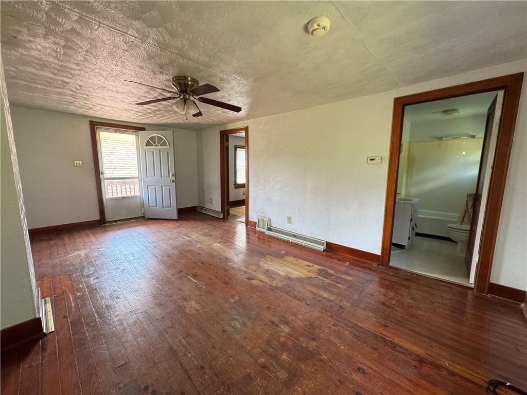 1076-1078 Addison Street Washington, PA 15301 - Photo 16 of 50 an empty room with wooden floor and windows