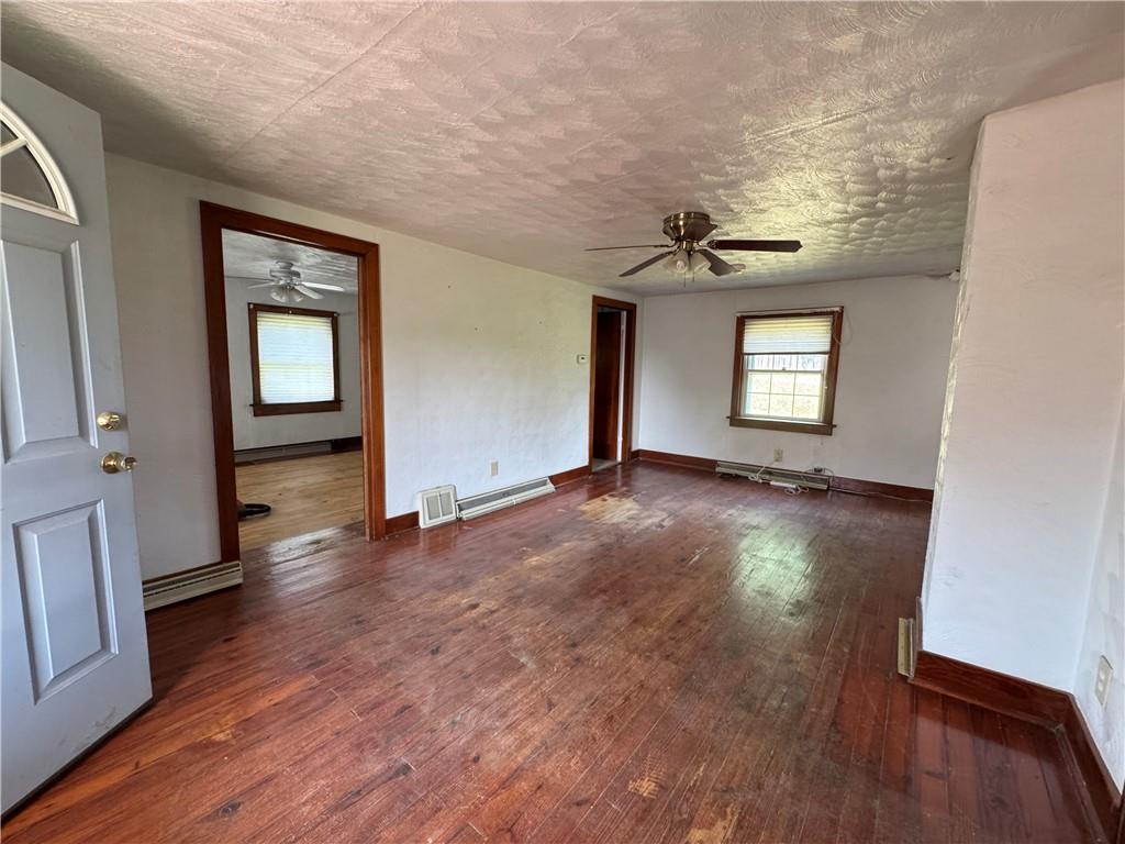 1076-1078 Addison Street Washington, PA 15301 - Photo 17 of 50 wooden floor in an empty room with a window