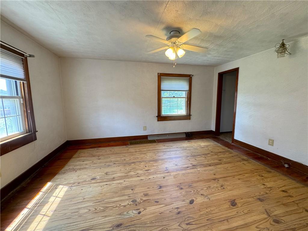 1076-1078 Addison Street Washington, PA 15301 - Photo 20 of 50 a view of an empty room with a window
