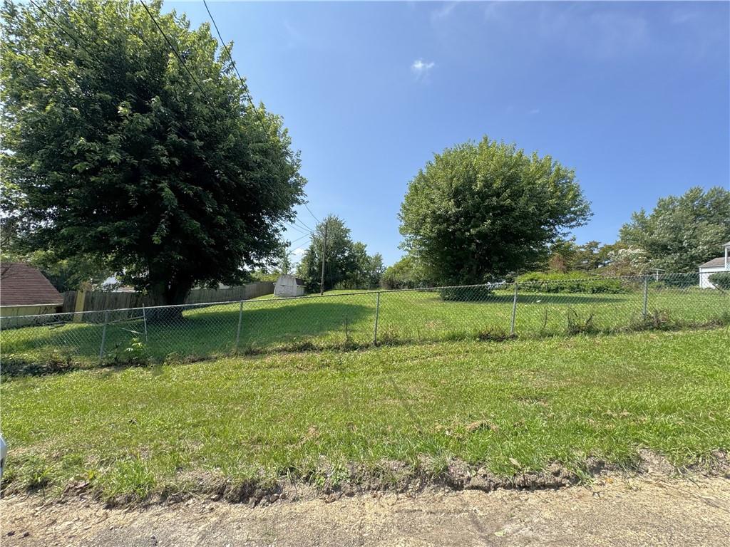 1076-1078 Addison Street Washington, PA 15301 - Photo 27 of 50 a view of a green field with wooden fence