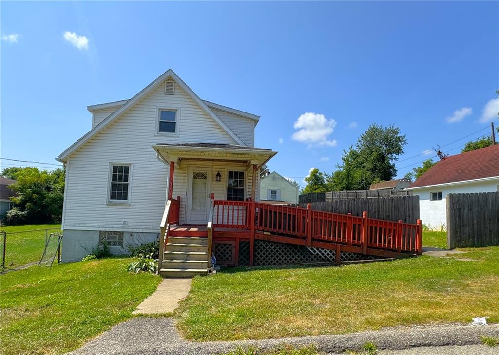 1076-1078 Addison Street Washington, PA 15301 - Photo 29 of 50 a view of a house with wooden deck and furniture