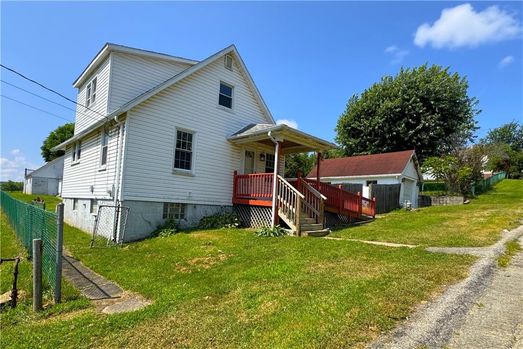 1076-1078 Addison Street Washington, PA 15301 - Photo 34 of 50 a view of a house with a yard and sitting area