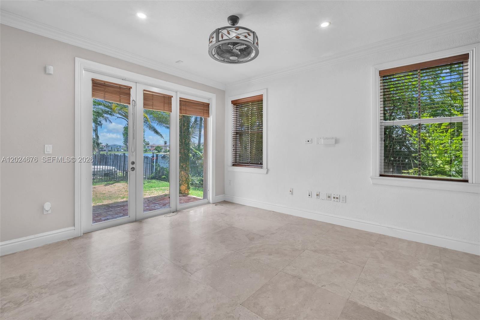 2155 Southwest 156th Court Miami, FL 33185 - Photo 8 of 57 a view of an empty room with a window
