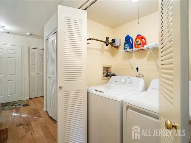 a utility room with dryer and washer