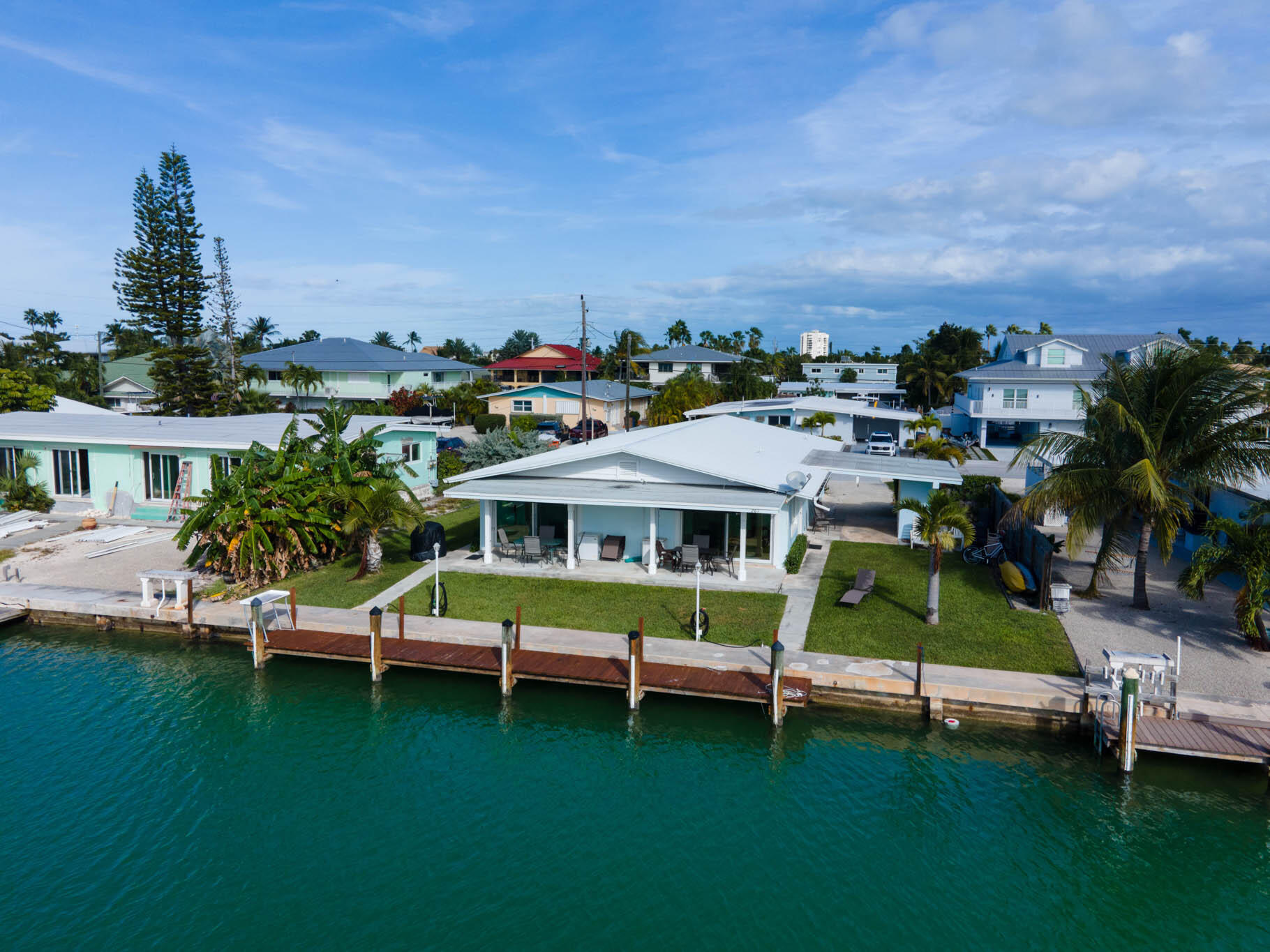 an aerial view of a house with a garden space
