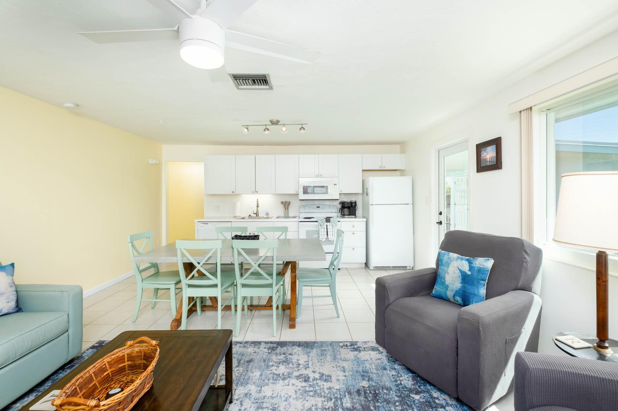261 9th Street Key Colony Beach, FL 33051 - Photo 8 of 42 a living room with furniture and a view of kitchen