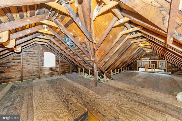 a view of a backyard with a wooden deck