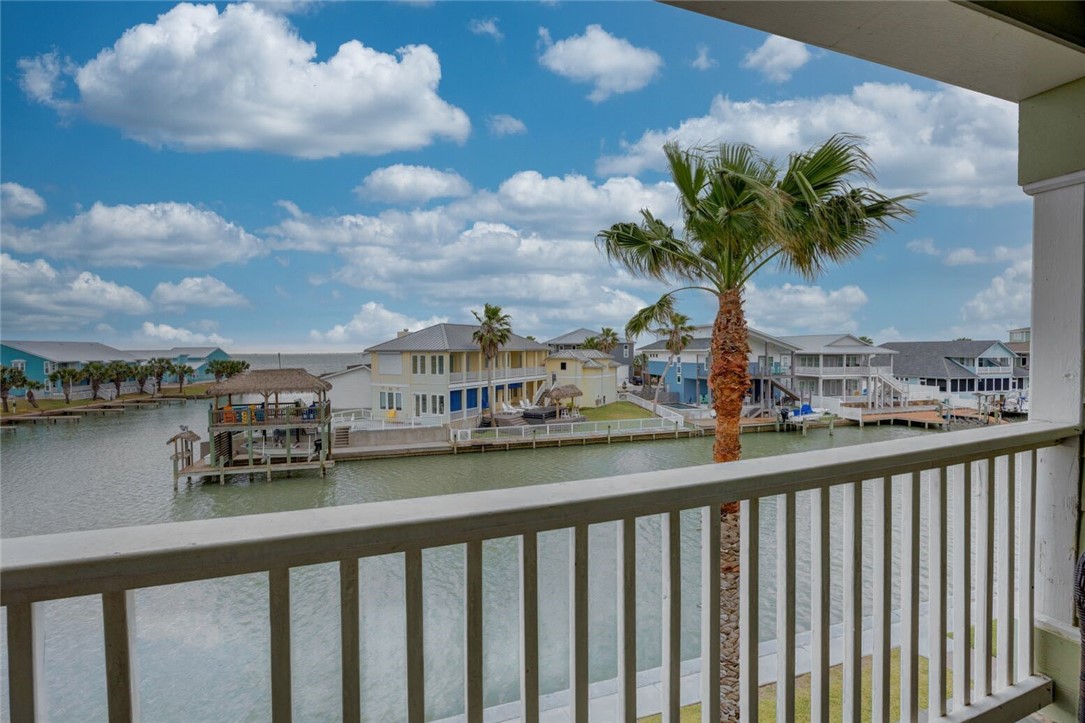 2290 North Fulton Beach Road, Unit 315 Rockport, TX 78382 - Photo 19 of 25 a view of a lake from a balcony