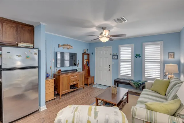 a living room with furniture and window