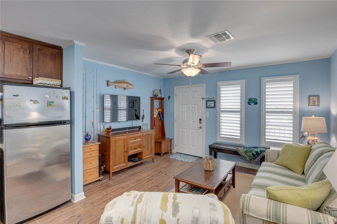 2290 North Fulton Beach Road, Unit 315 Rockport, TX 78382 - Photo 7 of 25 a living room with furniture and window