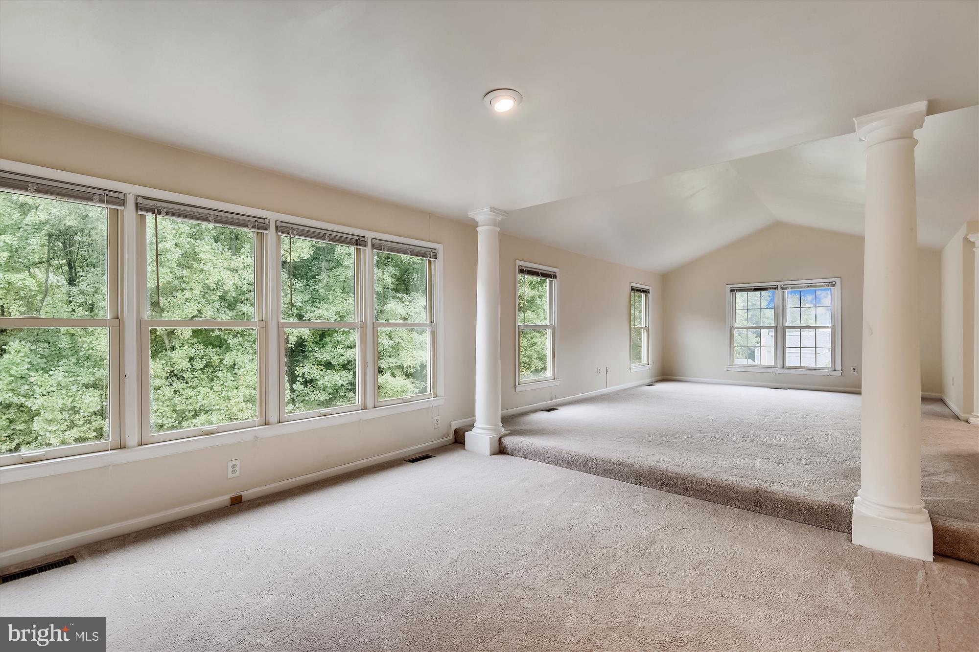 9715 Middleton Ridge Road Vienna, VA 22182 - Photo 13 of 29 a bed room with a bed and a large window