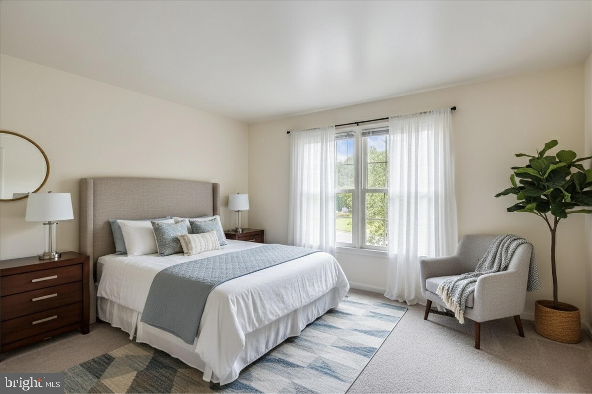 9715 Middleton Ridge Road Vienna, VA 22182 - Photo 16 of 30 a spacious bedroom with a bed and a couch