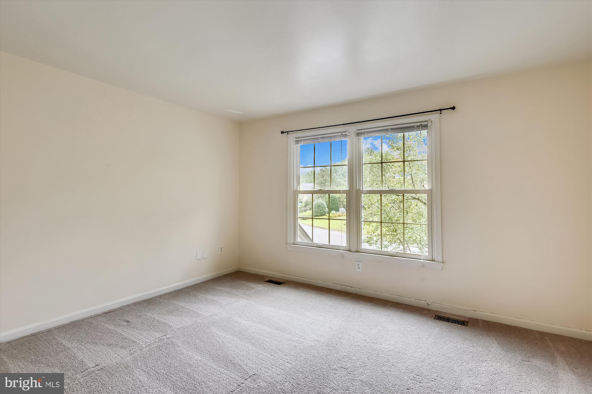 9715 Middleton Ridge Road Vienna, VA 22182 - Photo 19 of 29 an empty room with a window
