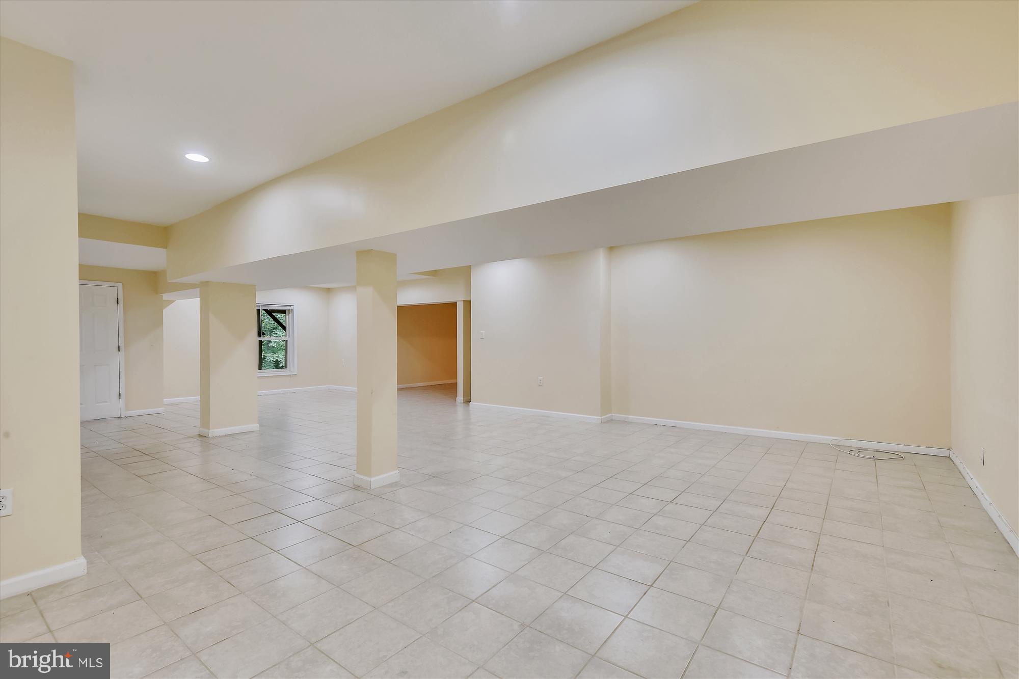 9715 Middleton Ridge Road Vienna, VA 22182 - Photo 22 of 29 a view of an empty room and window