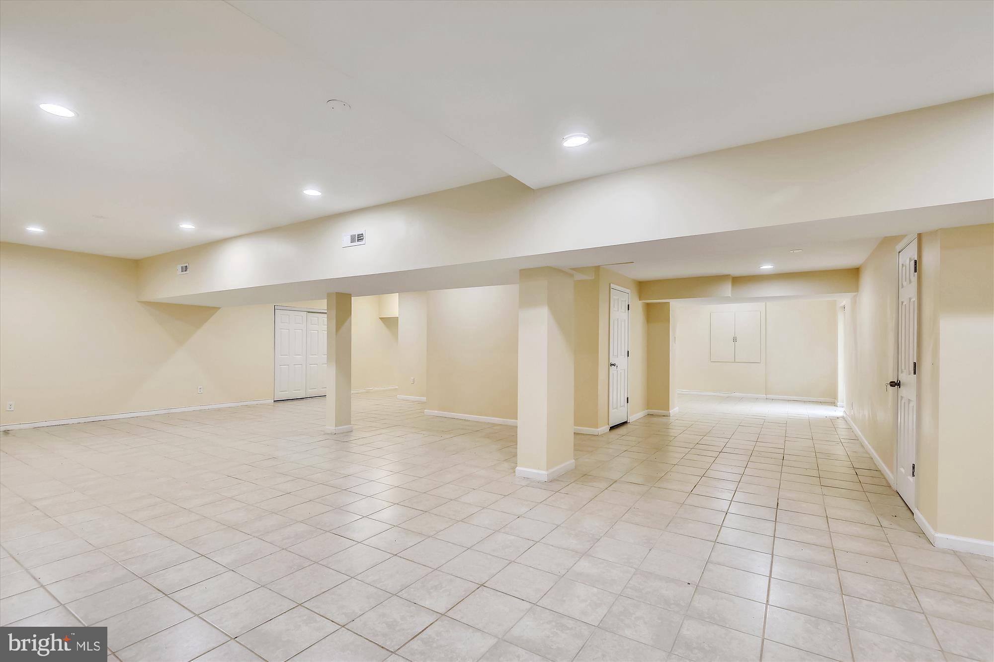 9715 Middleton Ridge Road Vienna, VA 22182 - Photo 23 of 29 a view of an empty room with wooden floor