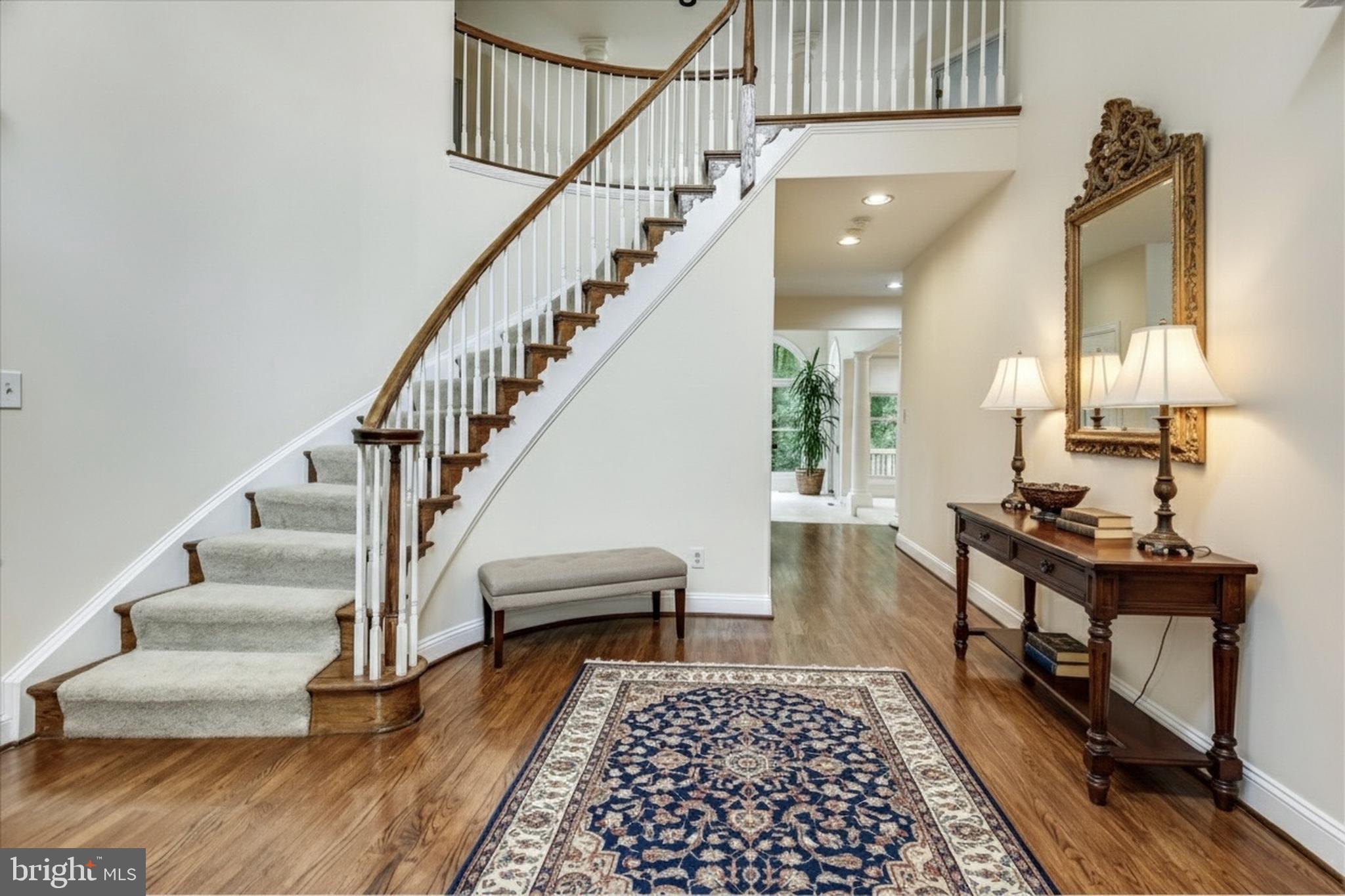 9715 Middleton Ridge Road Vienna, VA 22182 - Photo 4 of 30 a view of entryway and hall with wooden floor