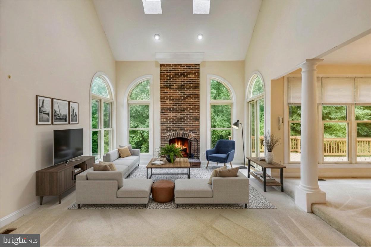 9715 Middleton Ridge Road Vienna, VA 22182 - Photo 7 of 30 a living room with furniture fireplace and flat screen tv