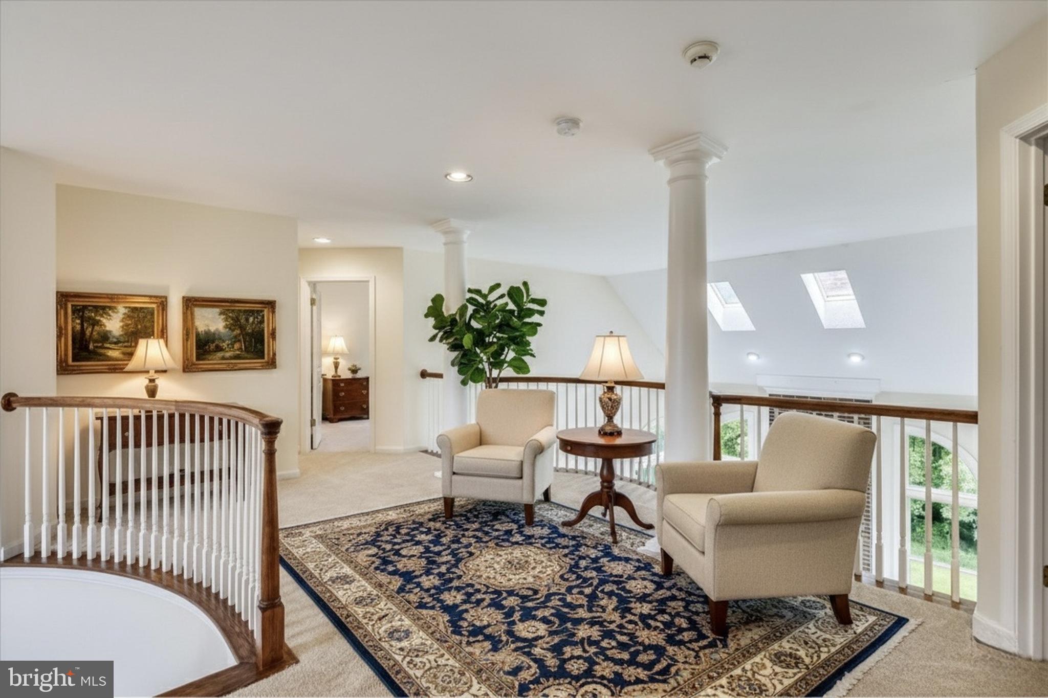 9715 Middleton Ridge Road Vienna, VA 22182 - Photo 10 of 30 a living room with furniture and wooden floor