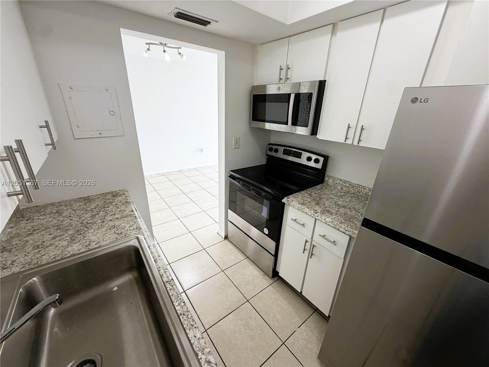 7340 Southwest 82nd Street, Unit C205 Miami, FL 33143 - Photo 2 of 18