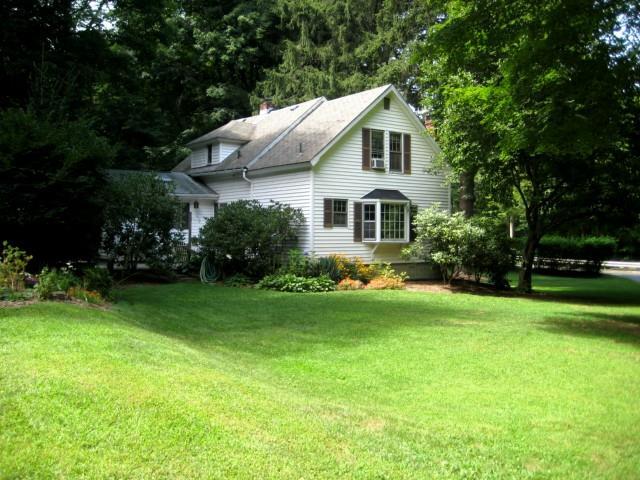 38 Dodgingtown Road Bethel, CT 06801 - Photo 1 of 1 a front view of house with yard and green space
