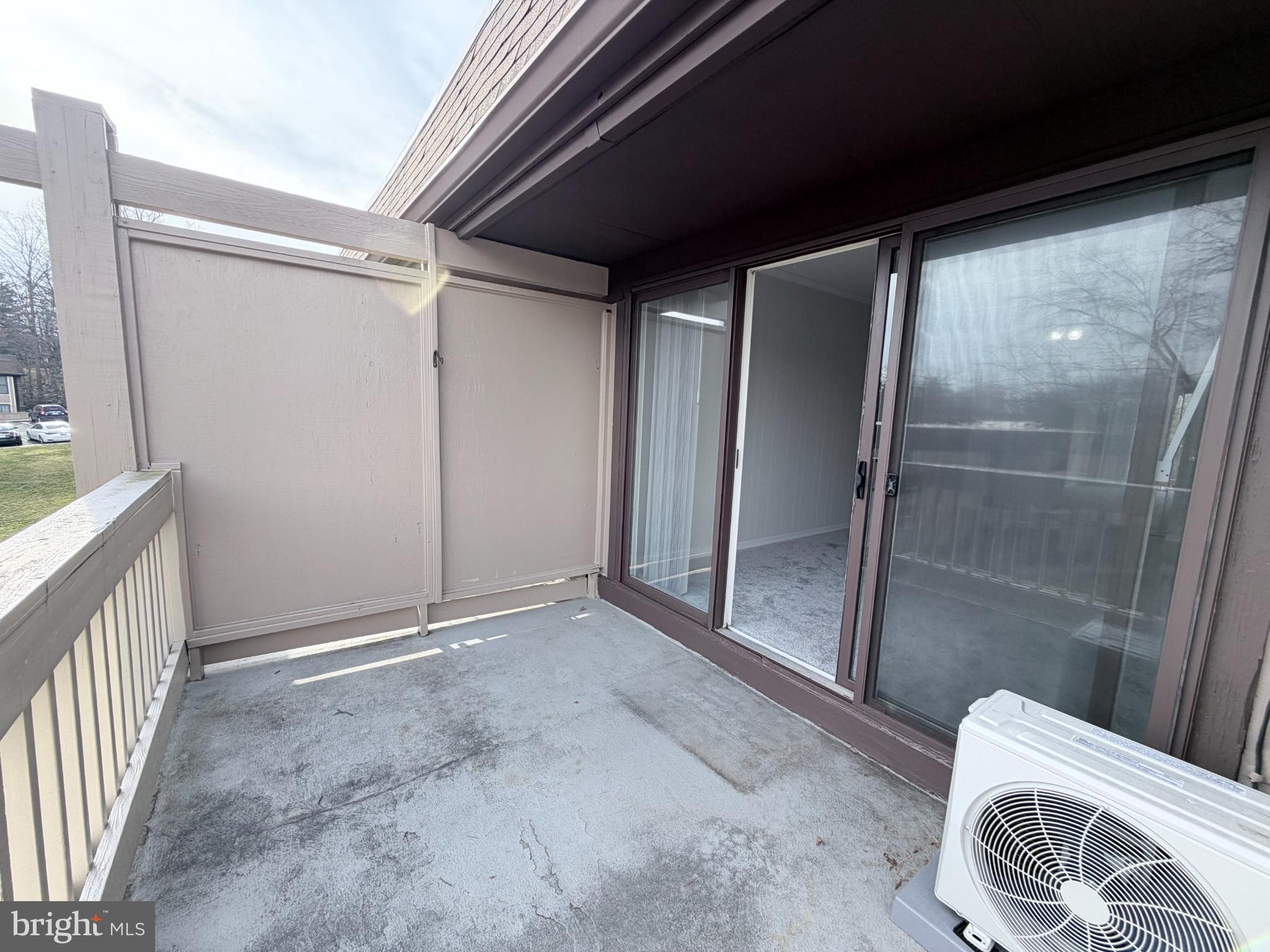 5823 S Royal Ridge Drive Springfield, VA 22152 - Photo 11 of 30 a view of an empty room and a glass door